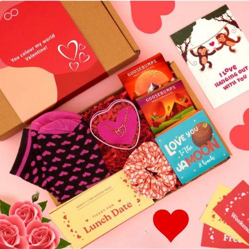 Gift Hamper Includes Chocolate, Fridge Magnet, Necklace, Date Night Love Coupons, Scrunchie, Cotton Socks